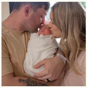 Wonderful moment in the life of a young family captured for posterity